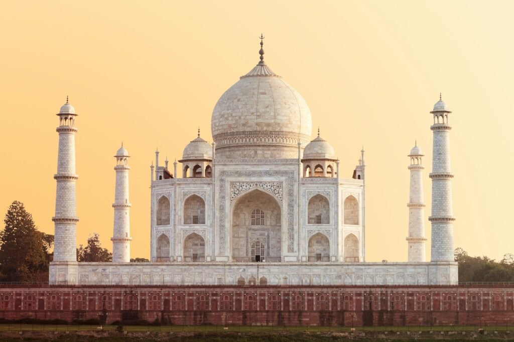 Taj Mahal, Agra, under warm golden hour sky