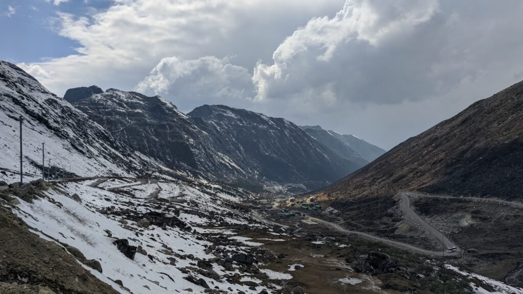 Sela Pass, snow covered mountain under cloudy sky, Arunachal Pradesh
