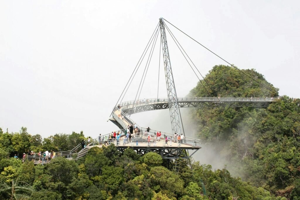 Langkawi Sky Bridge over misty rainforest mountain, Malaysia