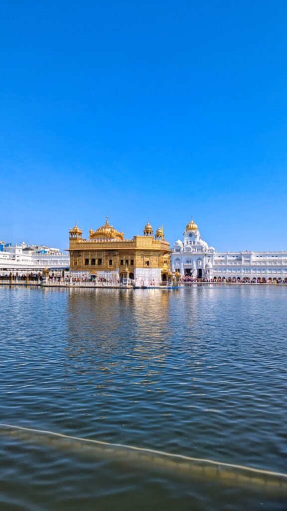 Golden Temple reflected in sacred pool (sarovar), Amritsar