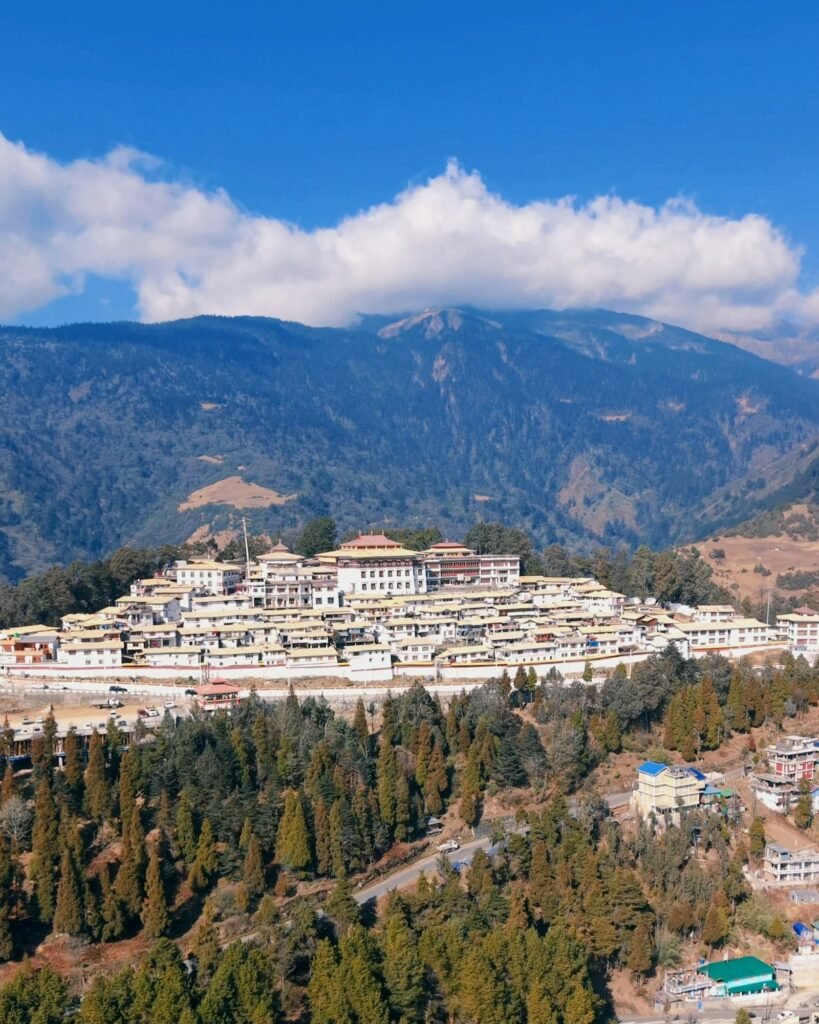 Tawang Monastery complex nestled on hillside with mountains, Arunachal Pradesh
