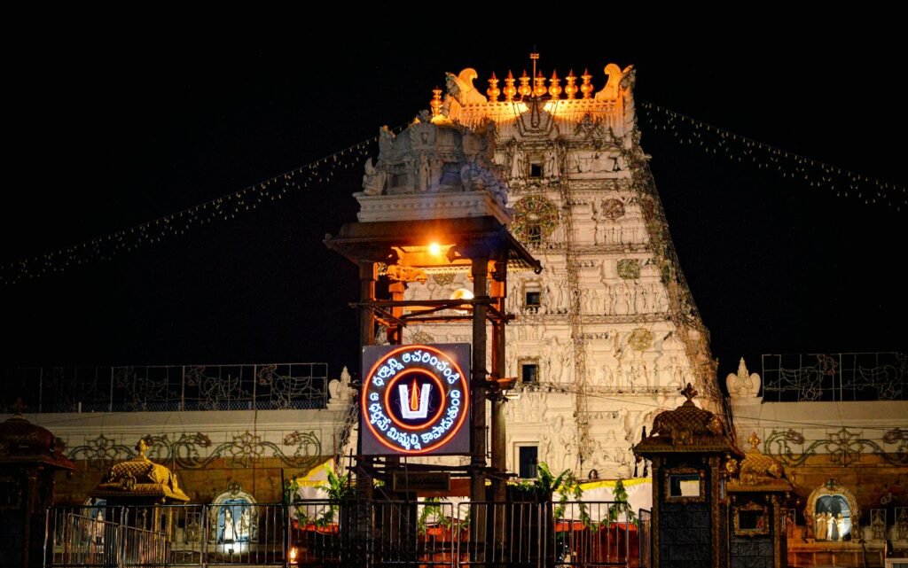 Illuminated gopuram of Tirumala Venkateswara Temple at night, Tirupati
